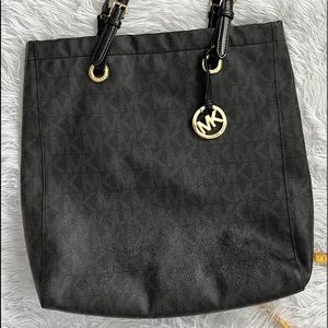 Black Michael Kors bag.